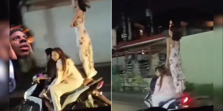 चलती स्कूटी पर अचानक खड़ी हो गई लड़की, बीच सड़क दिखाया दिल दहला देने वाला स्टंट