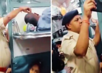 Viral Video: चलती ट्रेन में पुलिस ने शख्स की जेब से चुराया फोन! देखते रह गए लोग