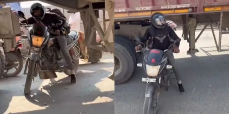 Viral Video: चालू ट्रक के बीच से निकलकर बंदे ने किया ऐसा कारनामा, वीडियो देख पक्का माथा पकड़ लेंगे आप