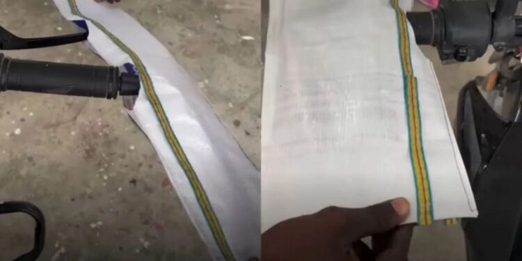 Viral Video: बाइक राइड के दौरान शख्स ने खुद को बचाने के लिए बैठाया तगाड़ा जुगाड़, वीडियो देख खूब हंसें लोग
