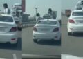 लाइक्स और व्यूज के लिए लड़कों ने कार के ऊपर चढ़कर बनाई रील, वायरल हुआ खतरनाक स्टंट का वीडियो