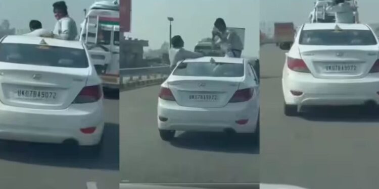 लाइक्स और व्यूज के लिए लड़कों ने कार के ऊपर चढ़कर बनाई रील, वायरल हुआ खतरनाक स्टंट का वीडियो