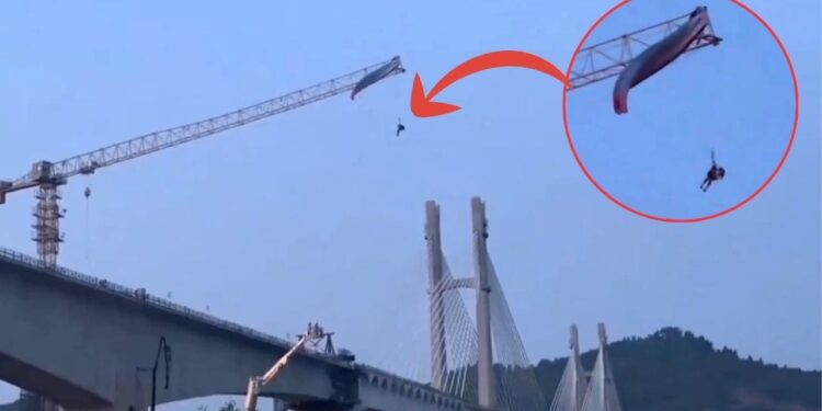 Video देख कांप उठेगी रूह! 200 फीट की ऊंचाई पर यूं क्रेन से 4 घंटे लटका रहा पैराग्लाइडर