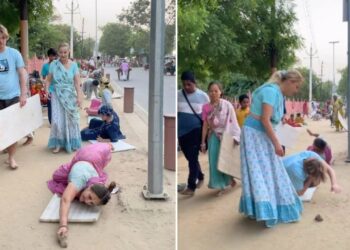 वृंदावन में गर्मी पर भारी पड़ी आस्था! विदेशी भक्तों की दंडवत परिक्रमा का वीडियो वायरल