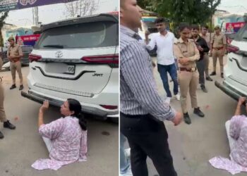 फॉर्च्यूनर कार के लिए सगे भाई-बहन में हाई वोल्टेज ड्रामा, गाड़ी के आगे लेट गई महिला; वीडियो वायरल